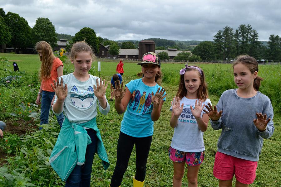 Farmer Camp Kids in Garden