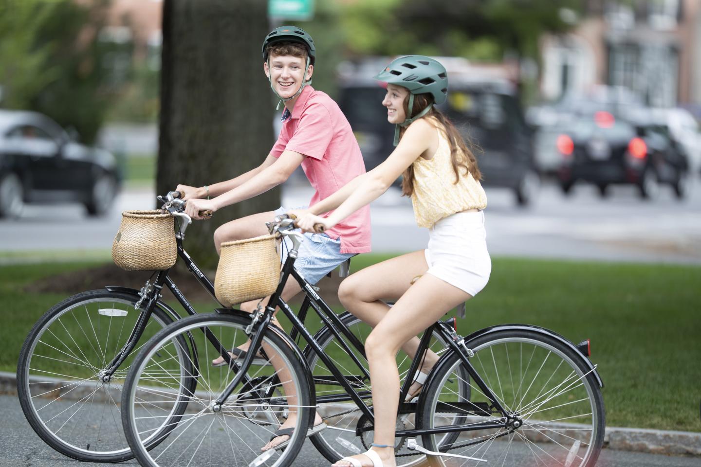 Siblings on Cruiser bikes in Woodstock village