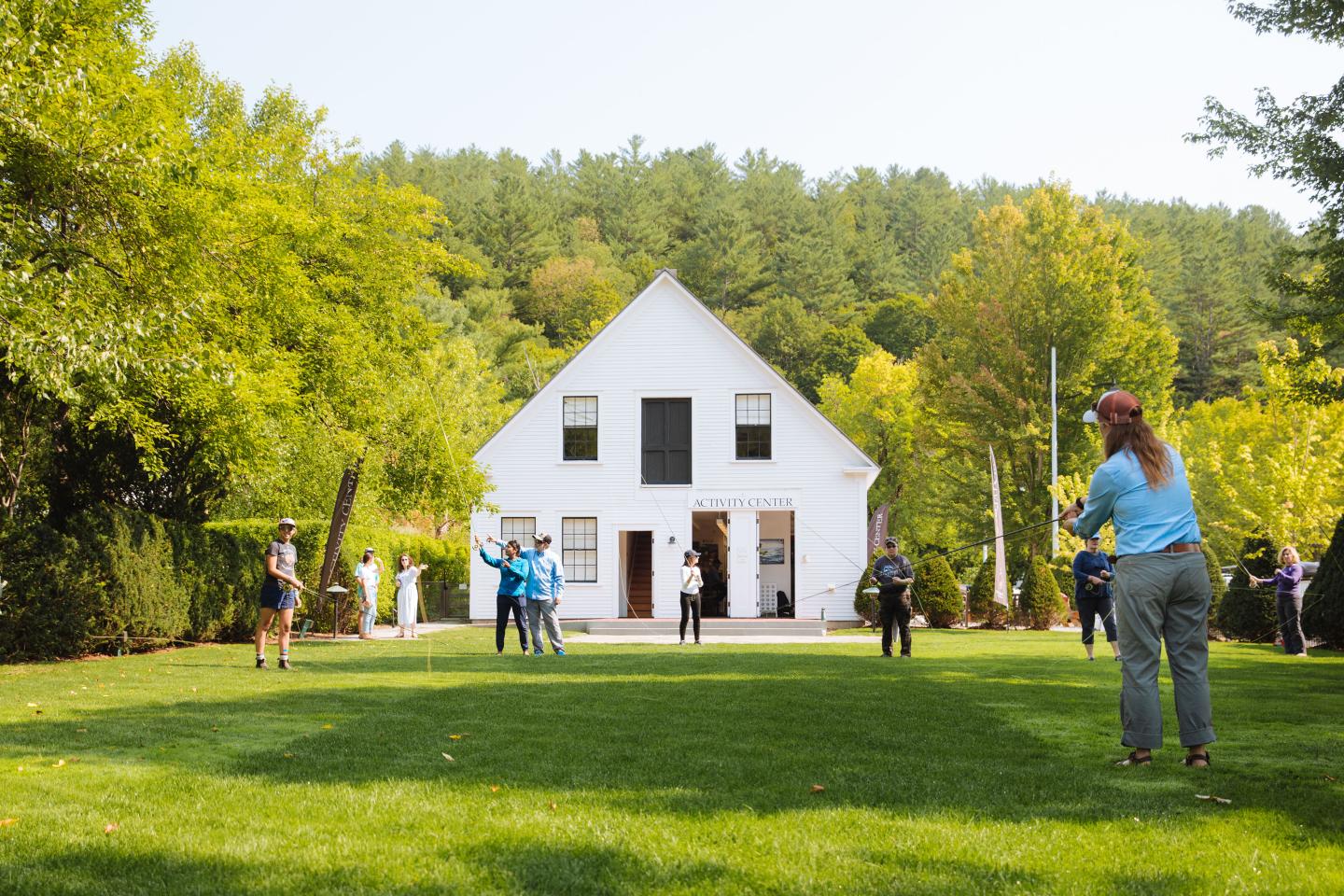 Group learning to Fly Fish on the lawn at the Activity Center