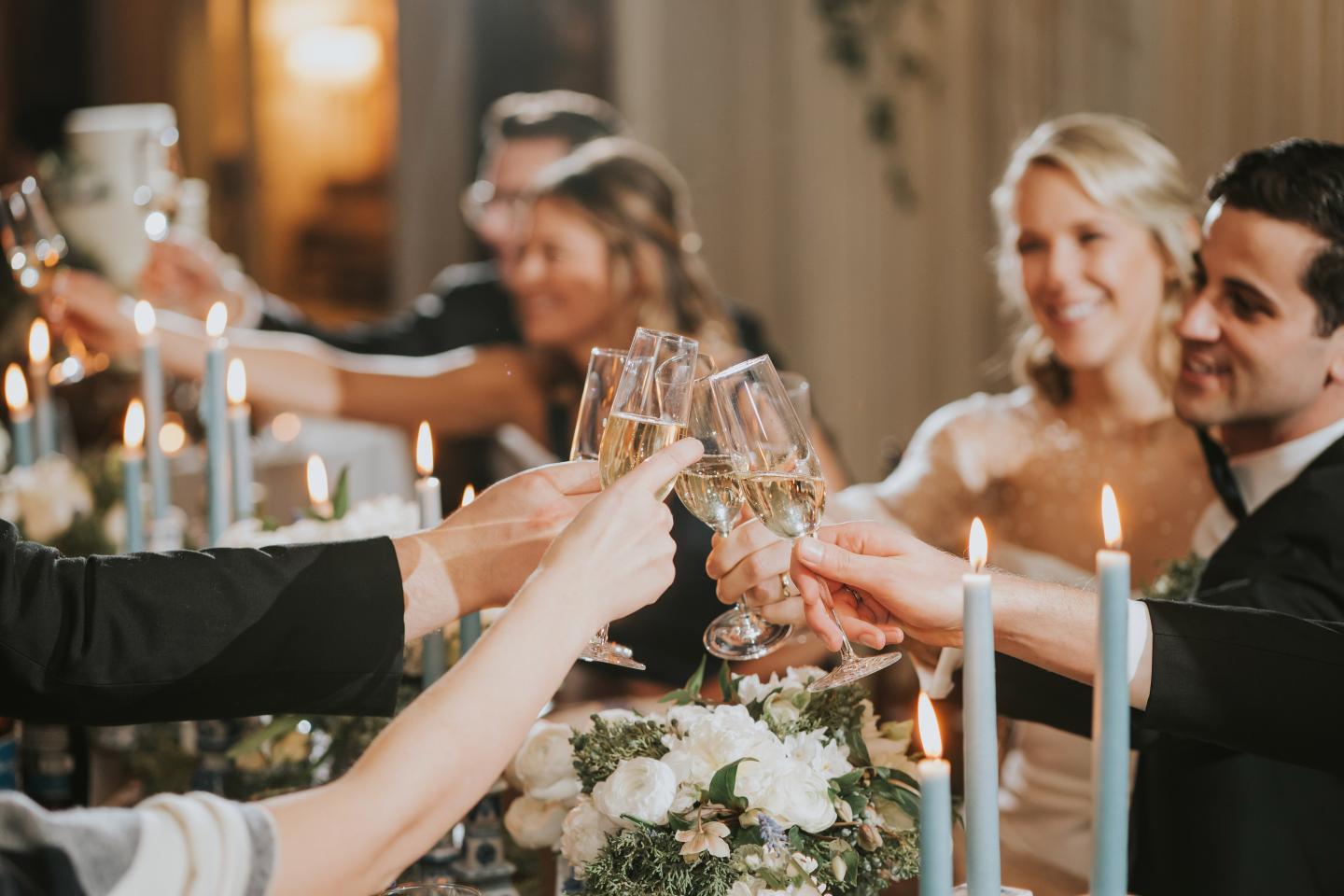 Cheers with sparkling wine at a wedding
