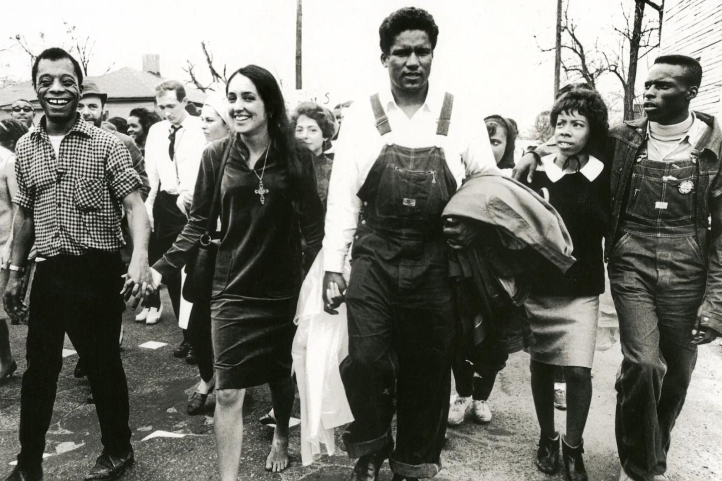 Joan Baez with a group of people