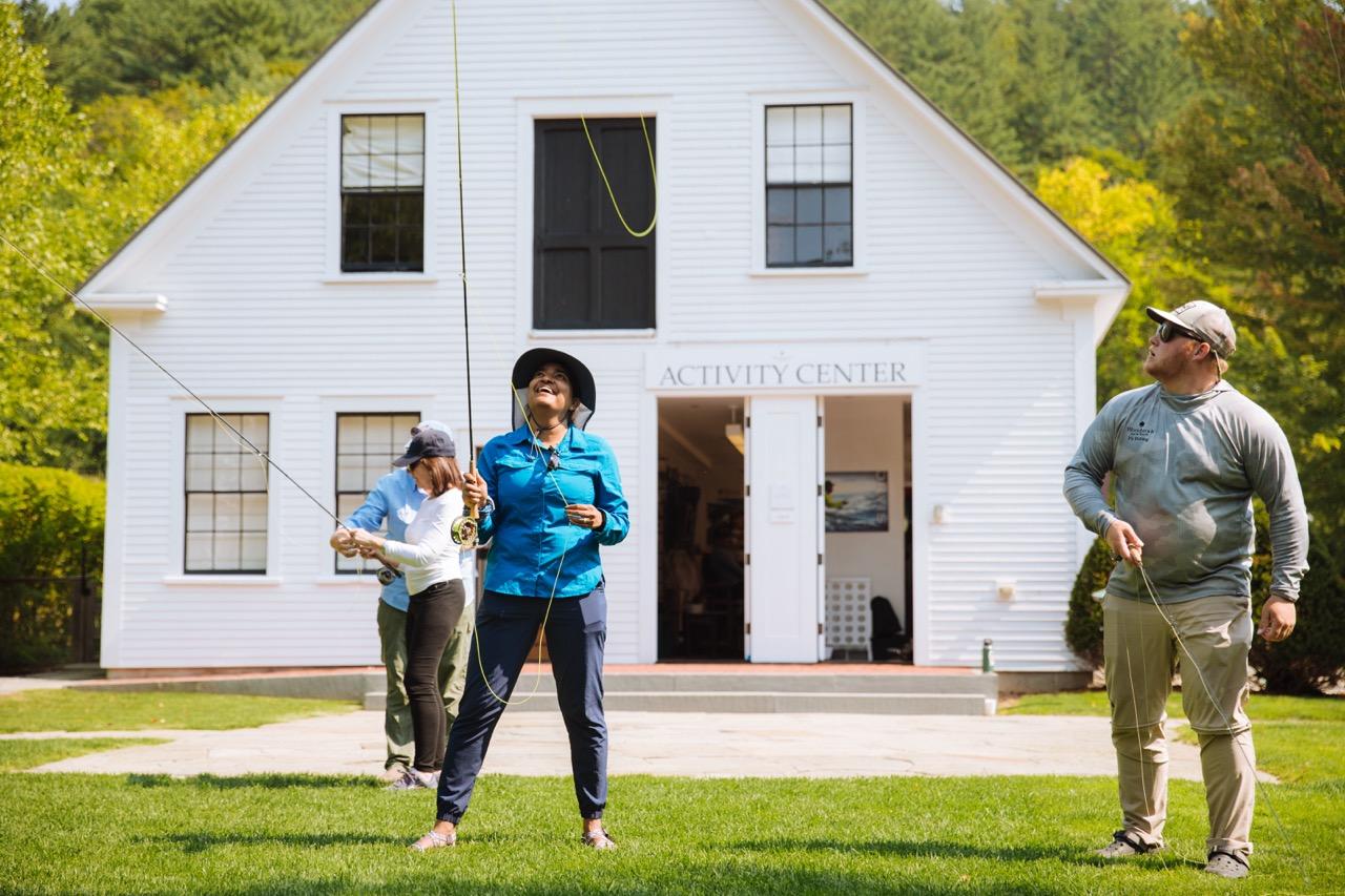 Group practice casting on the Activity Center lawn