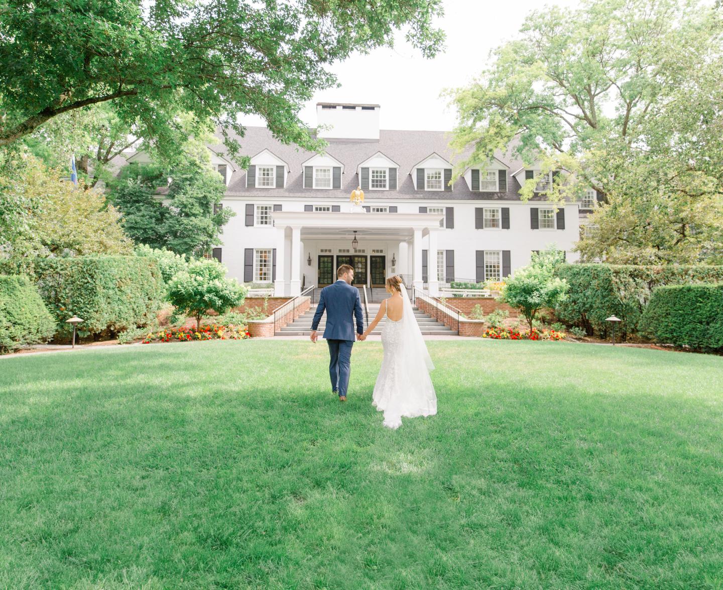 Bride and Groom on front lawn