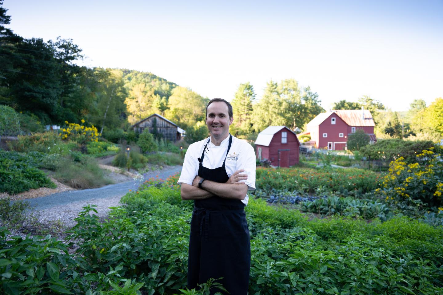 Chef Matthew McClure standing in Kelly Way gardens