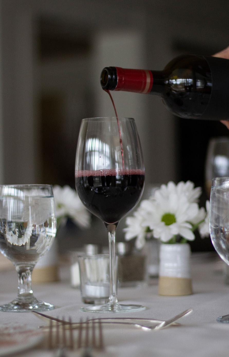 Red wine being poured