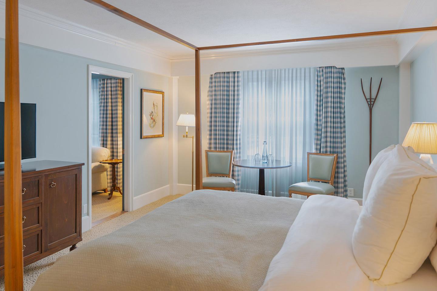 A king bedded suite at the Woodstock Inn